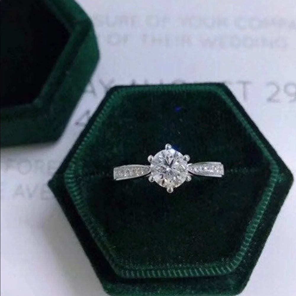 Moissanite Engagement Ring with side stones